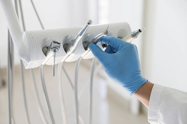 Professional Tooth Extraction technician working in Cupertino, CA